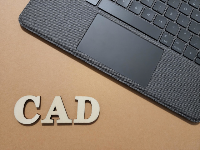 CADの文字とノートパソコン
